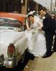 Wedding Couple enters Car, 1950s, WEDV01P05_09B