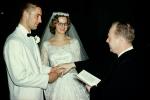 Bride, Groom, man, woman, officiant, ceremony, cateye glasses, Akron Ohio, 1950s